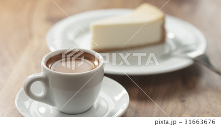 espresso and cheesecake on table espresso and cheesecake on table 31663676