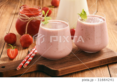 Healthy beverage- strawberry milkshake in glasses Healthy beverage- strawberry milkshake in glasses 31664241
