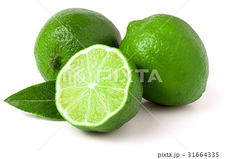 two limes with half and leaf isolated on white 31664335