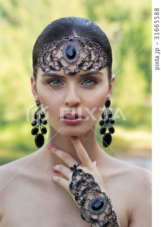 Portrait of beautiful woman with jewelry 31665588
