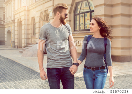 Young couple tourists city walk together vacation 31670233