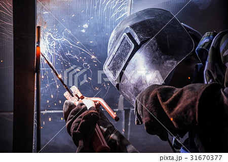Arc welding of a steel in construction site Arc welding of a steel in construction site 31670377