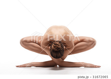 Naked woman doing gymnastics exercise 31672065