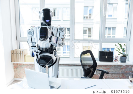 Cheerful robot is enjoying his day job 31673516