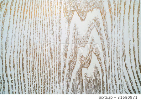Old board painted in white color and bronze patina 31680971