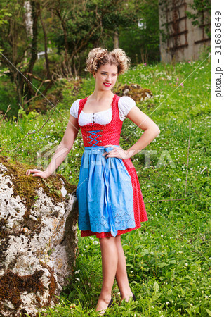 Woman in dirndl Woman in dirndl 31683649