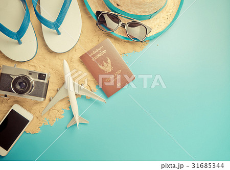 Summer travel accessories on sand beach Summer travel accessories on sand beach 31685344