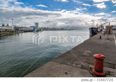 Seafront Ponta Delgada with the port. Seafront Ponta Delgada with the port. 31687728