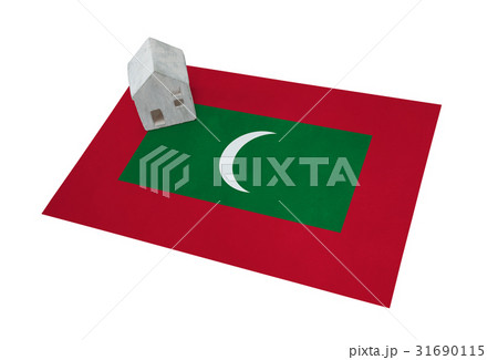 Small house on a flag - Maldives 31690115