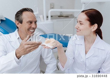 Portrait of positive coworkers while discussing Portrait of positive coworkers while discussing 31690448
