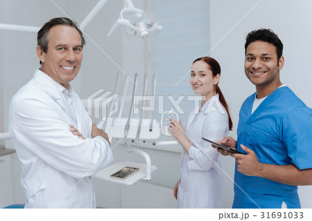 Horizontal photo of three colleagues while Horizontal photo of three colleagues while 31691033