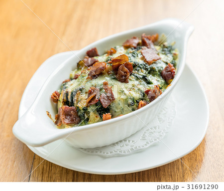 Baked spinach with cheese 31691290