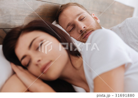 Shot of young man and woman sleeping soundly Shot of young man and woman sleeping soundly 31691880