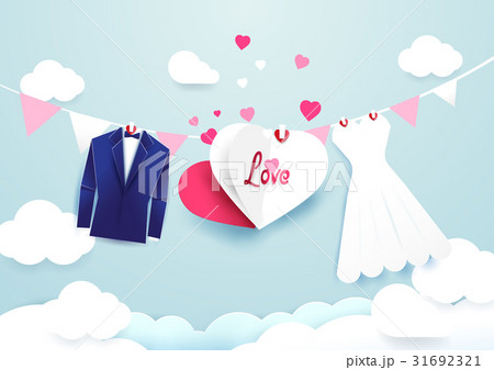 White dress and blue suit with heart sign hanging. 31692321