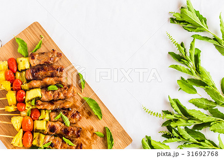 BBQ with ingredient on wood table 31692768
