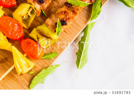 BBQ with ingredient on wood plate BBQ with ingredient on wood plate 31692783