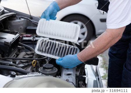 Car engine air filters, old and new 31694111