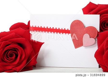 Hearts greeting card with red roses 31694899