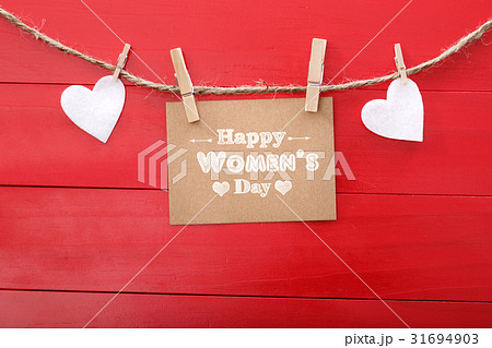 Womens day message with felt hearts hanging Womens day message with felt hearts hanging 31694903