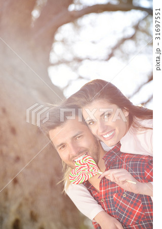 couple relax under the tree. Fine art style. Olive couple relax under the tree. Fine art style. Olive 31697551