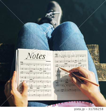 Hands working on notebook network graphic overlay 31706258