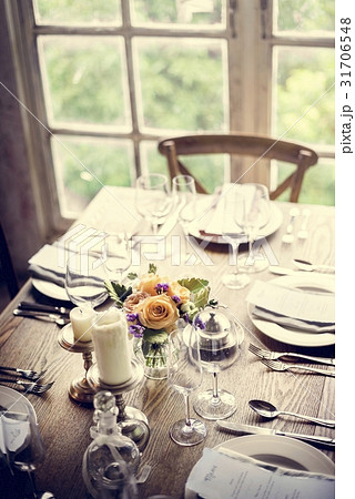 Elegant Restaurant Table Setting Service for Reception with Menu Elegant Restaurant Table Setting Service for Reception with Menu 31706548