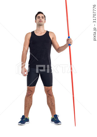Confident male athlete holding javelin 31707776