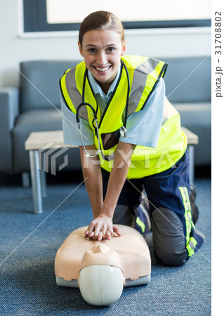 Female paramedic during cardiopulmonary resuscitation training 31708802