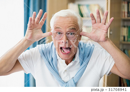 Senior man making faces Senior man making faces 31708941