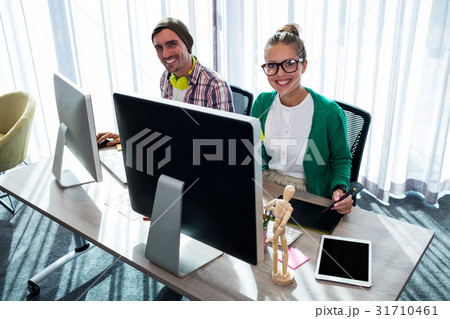 Coworkers on computer 31710461