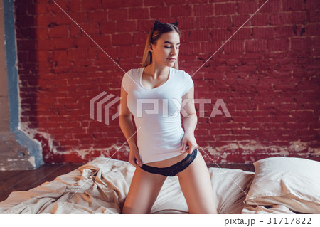 Hot blonde woman with big boobs on white - Stock Photo [25456612] - PIXTA