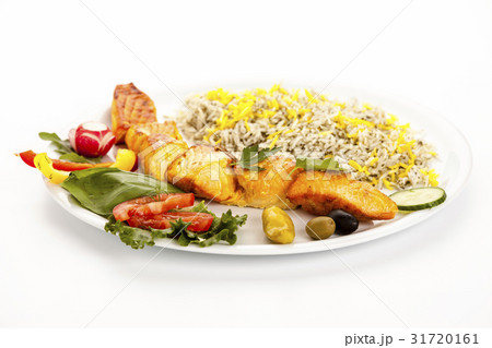 Low Angle Studio Shot Of Salmon Kebab On White Low Angle Studio Shot Of Salmon Kebab On White 31720161