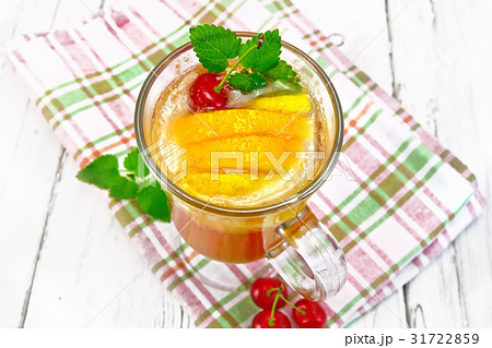 Lemonade with cherry and orange in wineglass Lemonade with cherry and orange in wineglass 31722859