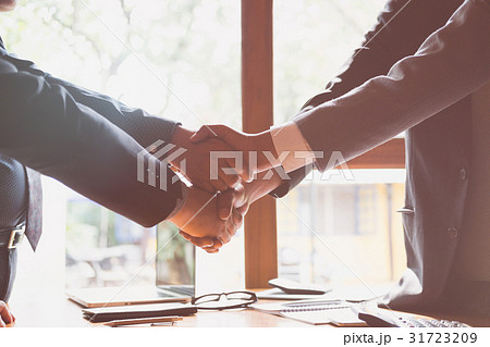 Business people shaking hands after meeting. Busi 31723209