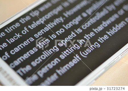 Teleprompter automatically scrolls text close-up. Teleprompter automatically scrolls text close-up. 31723274