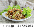 mango salad on a wood floor 31725363
