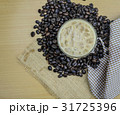 Top view of iced coffee on wooden table 31725396