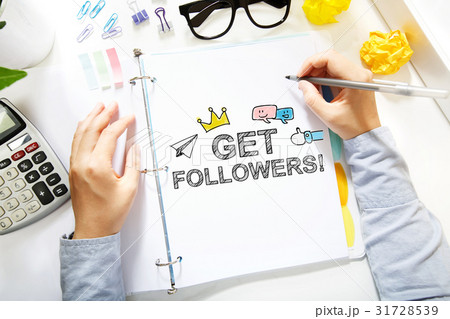 Person drawing Get More Followers concept on white 31728539