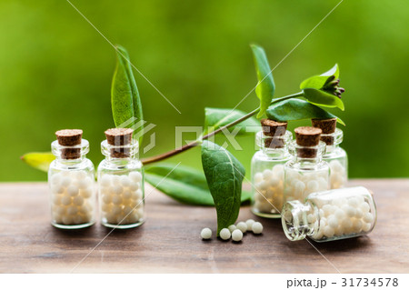 Homeopathy pills in vintage bottles 31734578