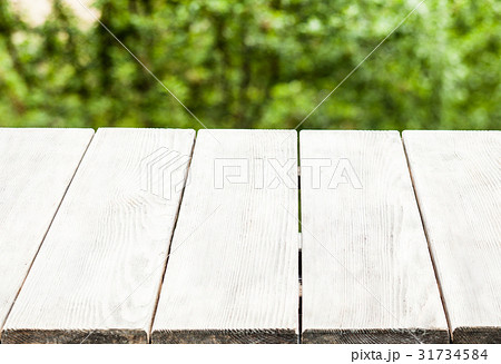 A rustic wooden bench  31734584