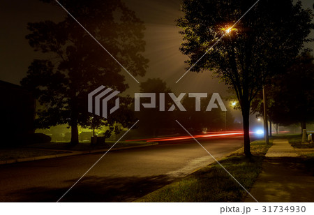 Apartment block on empty night city street Apartment block on empty night city street 31734930