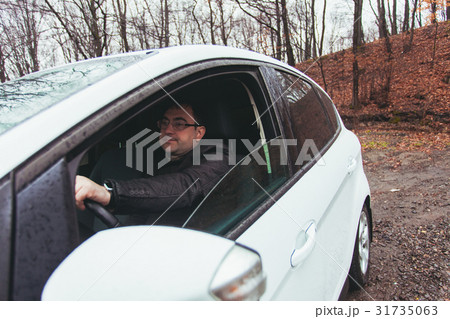 Trip by car in the autumn rainy day Trip by car in the autumn rainy day 31735063