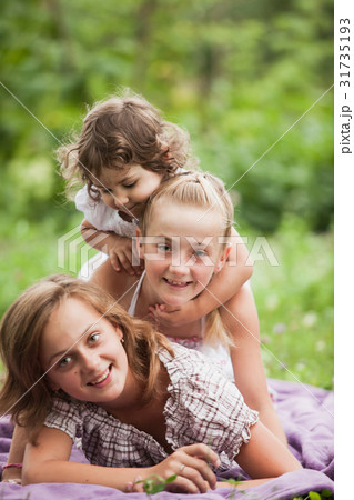 Happy family outdoors Happy family outdoors 31735193