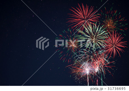 Sparkling red green yellow fireworks 31736695
