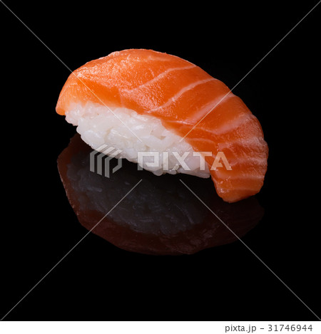 Sushi served on a black background with reflection 31746944