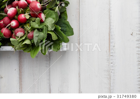 Fresh radish in wooden box 31749380