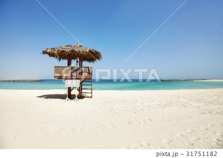 Wooden lifeguard tower on a tropical beach 31751182
