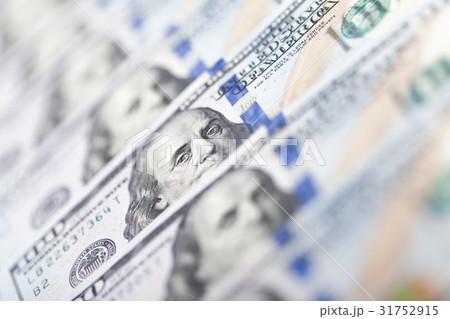Row of one hundred US dollar bills Row of one hundred US dollar bills 31752915
