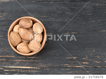 Nutmeg in bowl Nutmeg in bowl 31756076