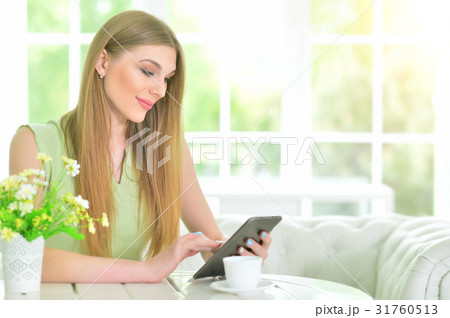 woman using  digital tablet  31760513